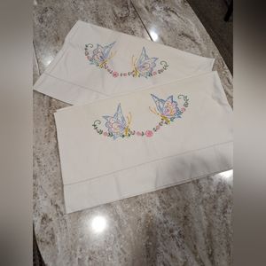 - 2 Hand embroidery pillow cases.